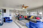 Modern design, sectional sofa sleeper, accent chairs, open concept living space